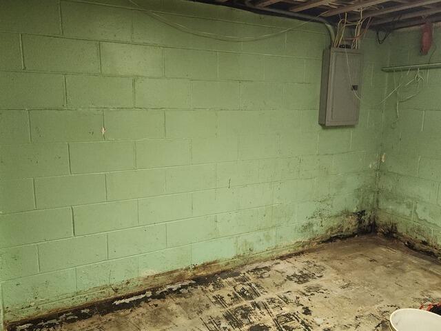 Basement Waterproofing in Galesburg, IL - Before Photo