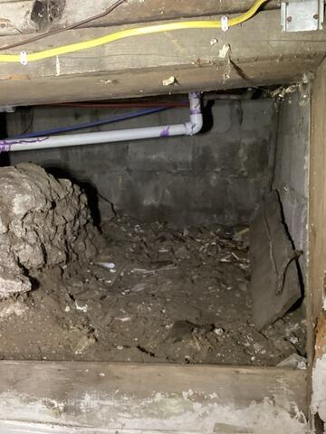 Basement Waterproofing in Manchester, IA - Before Photo