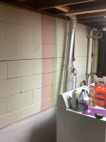Basement Waterproofing and Wall Support in Davenport, IA - Before Photo