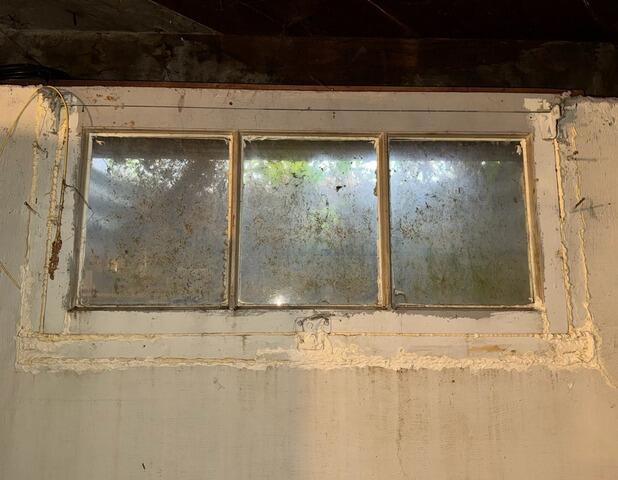 Basement Waterproofing in Bettendorf, IA - Before Photo