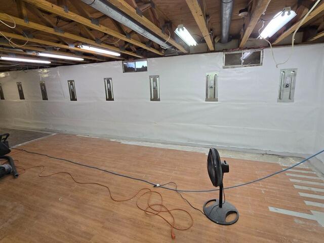 Major Basement Finishing with Waterproofing and Wall Support in Cedar Falls, IA - After Photo