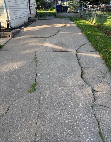 Teamwork Makes the Driveway Work in Davenport, IA - Before Photo