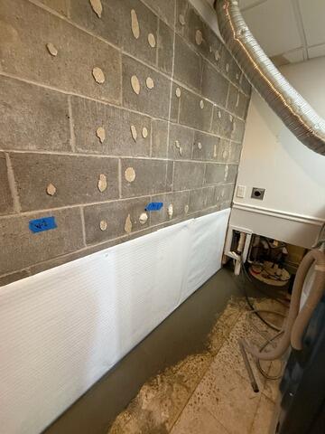 Comprehensive Sub-Floor Drainage and Environmental Control Optimization Resolves Basement Moisture Ingress in Geneseo, IL - After Photo