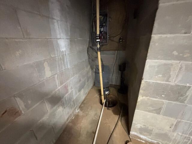 Multi-Tiered Sub-Floor Hydrodynamic Management and Carbon Fiber Reinforcement Resolves Foundation Failure in Orion, IL - Before Photo