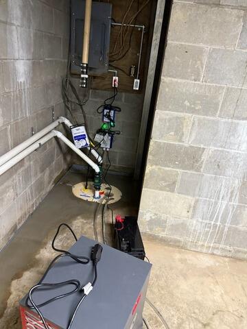 Multi-Tiered Sub-Floor Hydrodynamic Management and Carbon Fiber Reinforcement Resolves Foundation Failure in Orion, IL - After Photo