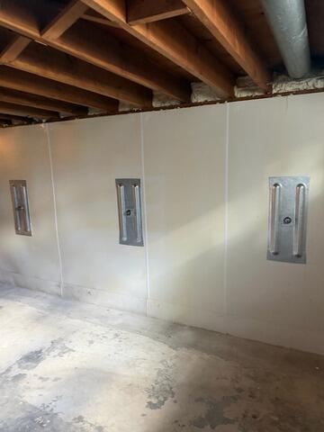 Foundation Wall Stabilization and Structural Reinforcement in Waterloo, IA - After Photo