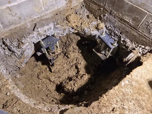 Stabilizing Deep Foundations: Helical Pier Installation in Davenport, IA - Before Photo