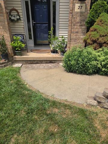 Super Sidewalk Lift in East Dubuque, IL - Before Photo