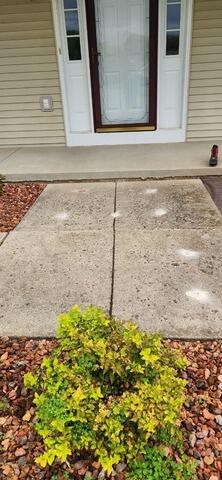 Concrete Slab Lifted and Leveled in Byron, IL - Before Photo