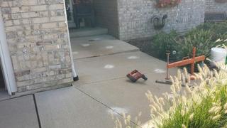 Injection Technology Levels Sidewalk to Home Entrance in Dubuque, IA