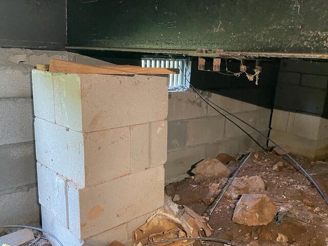 Sinking Floor Repair With SmartJack Support Posts in Milledgeville, GA - Before Photo