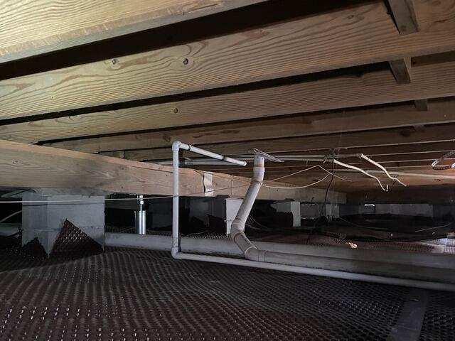 Adding Support System to Sinking Crawl Space in Rincon, GA - Before Photo