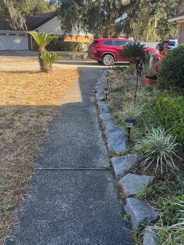 Sidewalk Repair in Brunswick, GA - Before Photo
