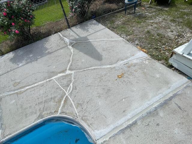 Pool Deck Cracks Sealed in Pembroke, GA - After Photo