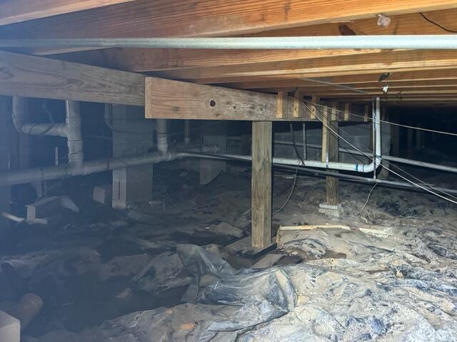 Crawl Space Encapsulation Eliminates Standing Water in Midway, GA - Before Photo