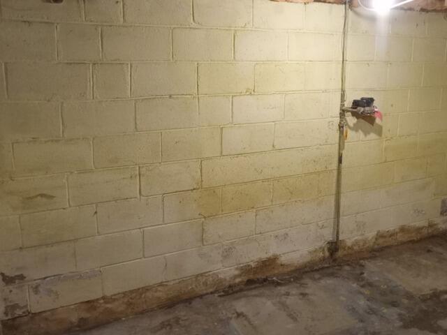 Basement waterproofing with wall support in Welland, On - Before Photo