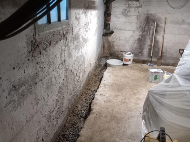 Waterproofing a poured concrete basement in Caledonia, ON - Before Photo