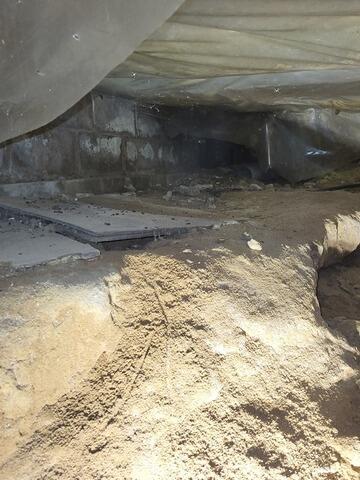 Vapor Barrier installed in a Niagara Falls Crawlspace - Before Photo