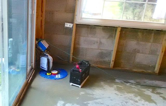 SuperSump with UltraSump Battery Backup Installed in Walkout Basement in West Grove, PA - After Photo