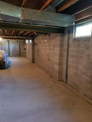 Bowed Walls and Wet Basement Fixed in Kennett Square, PA - Before Photo