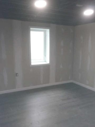 Hockessin home needs waterproofing, foundation repair, egress, and finishing - After Photo