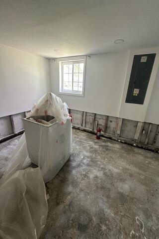 New Basement Floors in Colonia, NJ - Before Photo