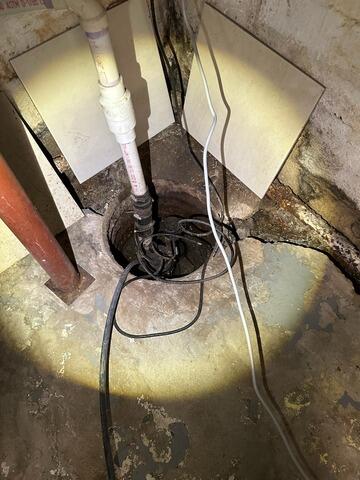 Eradicating Basement Moisture Intrusion In Cedar Grove, NJ - Before Photo