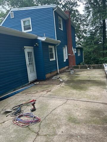 Transforming a Sunken and Cracked Patio in Boonton, NJ - Before Photo