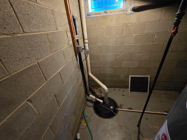 Tackling Drainage Issues In Matawan, NJ Basement - Before Photo