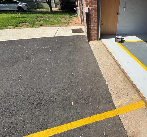 Addressing Concrete Garage Settlement In Dunellen, NJ - Before Photo