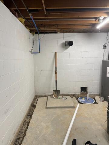 Transforming a Wet Basement in Glen Mills, PA - Before Photo