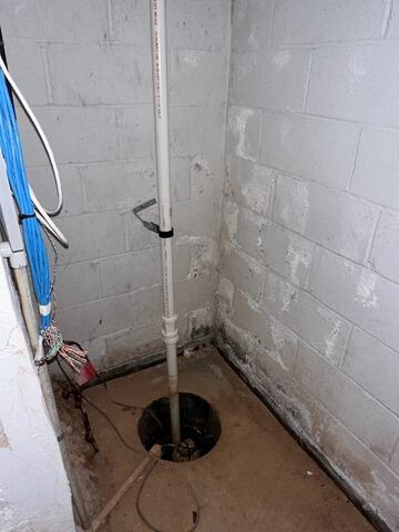 Preventing Drainage Issues In Nutley, NJ Basement - Before Photo