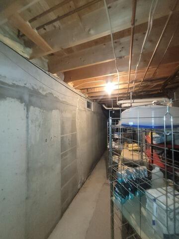 Bowing Wall Repair Solution In Howell, NJ Basement - Before Photo