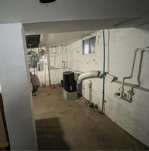 Combatting Water Seepage In East Orange, NJ Basement - Before Photo
