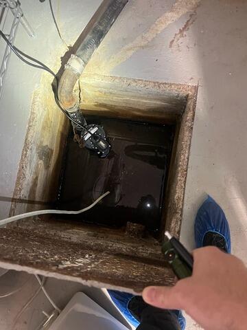 Ineffective Sump Pump Solution In Brooklyn, NY Basement - Before Photo