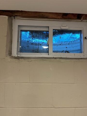 Tackling Basement Window Moisture In Red Bank, NJ - Before Photo