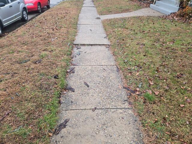 Concrete Sidewalk Repair In Laurel Springs, NJ - Before Photo