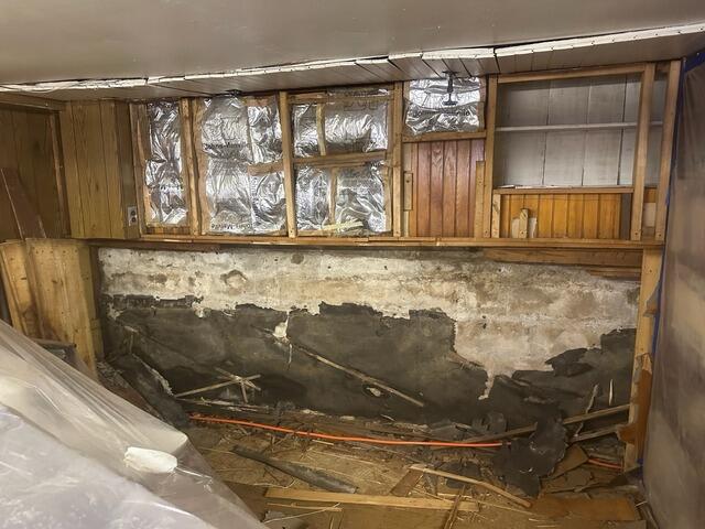 Transforming a Damp Basement in Jamaica, NY - Before Photo