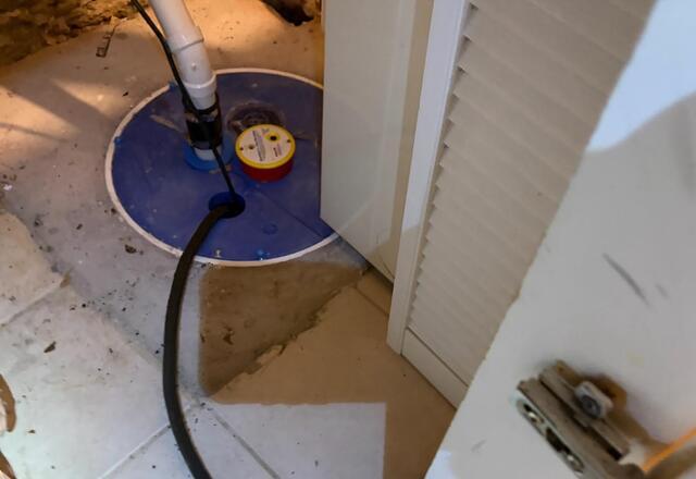 Prepared to Alert Homeowner - Sump Pump Maintenance on WaterWatch Alarm - Before Photo