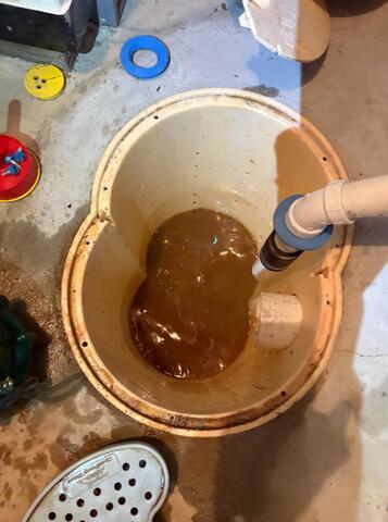SuperSump Annual Maintenance for Wet Basement Solution - Before Photo