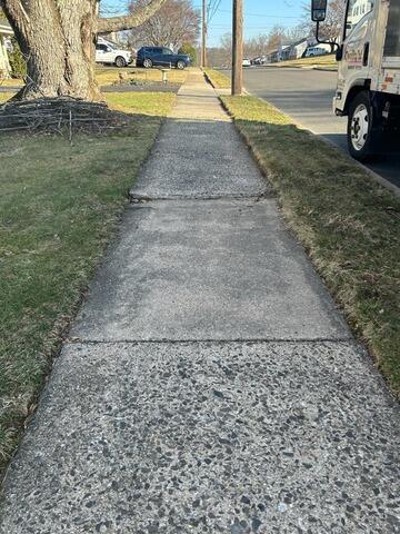 Lifting a Sunken Sidewalk in Warminster, PA - Before Photo