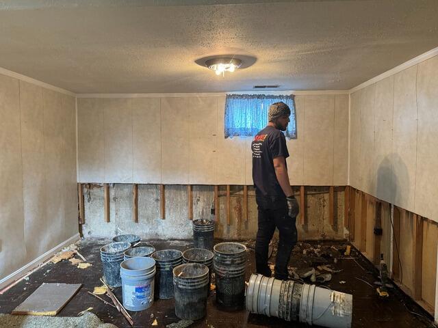 Addressing Basement Water Seepage in New Castle, DE - Before Photo