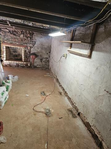 Addressing Basement Water Seepage in Collegeville, PA - Before Photo