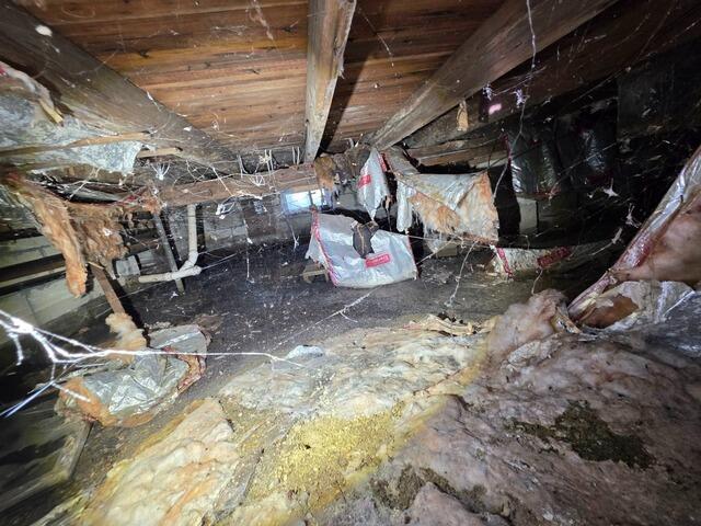 Addressing Crawl Space Sagging Floors and Dampness in Belmar, NJ - Before Photo