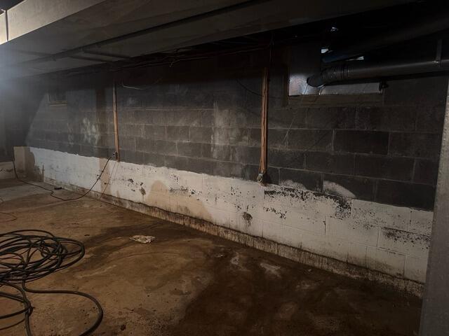 Waterproofing a Wet Basement in Succasunna, NJ - Before Photo