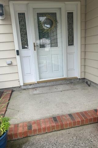 Sinking Concrete Porch Repair In Howell, NJ - Before Photo