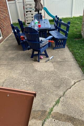 Repairing a Concrete Patio in Sayreville, NJ - Before Photo