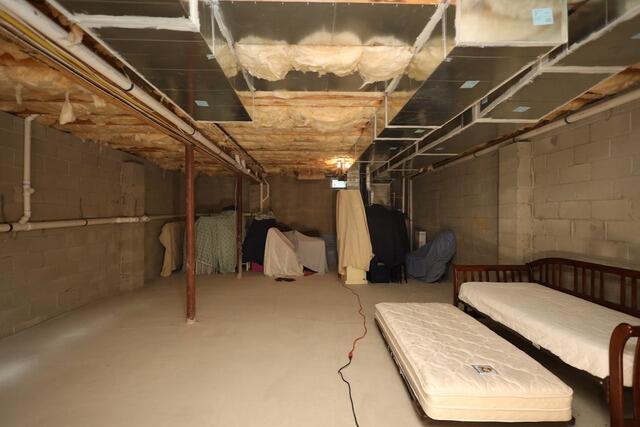 Total Basement Finishing Project in Holmdel, NJ - Before Photo