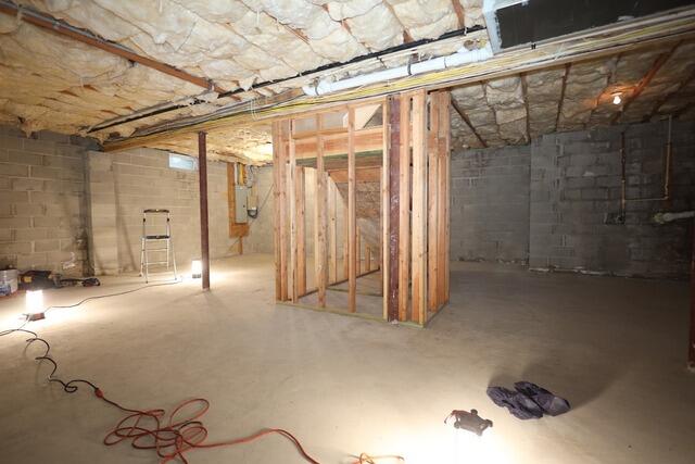 Transforming an Unfinished Basement in Holmdel, NJ - Before Photo