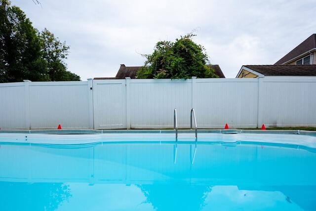 Lifting and Leveling a Concrete Pool Deck in Colonia, NJ - Before Photo